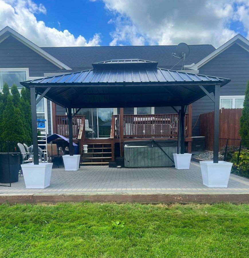 Finished backyard gazebo with metal roof